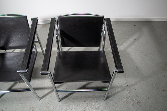 Image 1 of Set van 2 Cassina LC1 loungestoelen met originele certificaten 1980