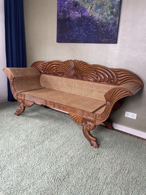 Image 1 of Javaanse teak bank met houtsnijwerk en webbing