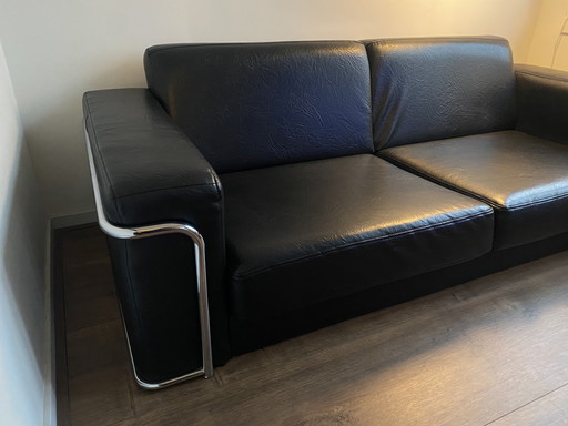 Zwarte Sofa Met Zilveren Details