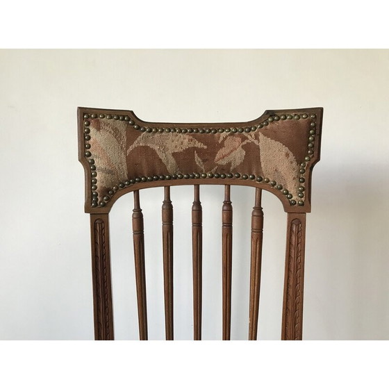 Image 1 of Vintage kinderstoel van hout en stof