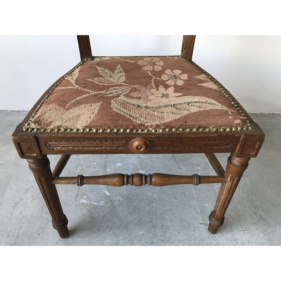 Image 1 of Vintage kinderstoel van hout en stof