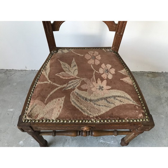 Image 1 of Vintage kinderstoel van hout en stof