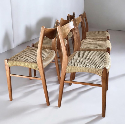 Set van 6 teakhouten stoelen Arne Wahl Iversen "Gs 60" met uitschuifbare tafel