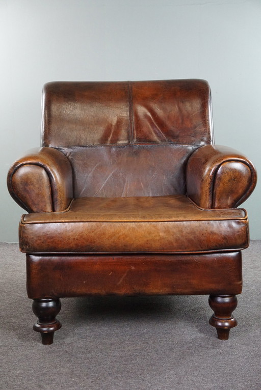 Grote schapenleren armchair/ fauteuil met een diepe zit