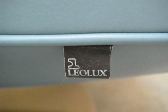 Image 1 of Leolux Ottana draaifauteuil met hocker en kussen