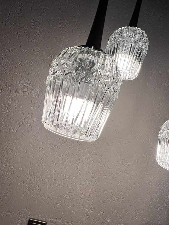 Image 1 of Mid Century cascadelamp van Baum Leuchten Neheim Hüsten met het artikelnummer 8000/5. 5 lichtpunten gemaakt van teakhout, glas