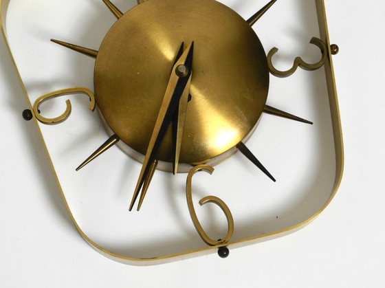 Image 1 of Prachtige zeer stijlvolle Mid Century Moderne Kienzle messing wandklok met originele batterijaandrijving