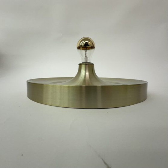 Image 1 of Mid Century design gouden wandlamp disc , jaren 1970