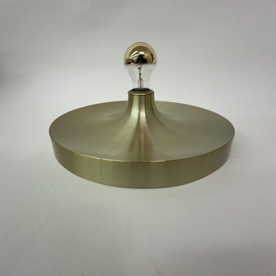 Image 1 of Mid Century design gouden wandlamp disc , jaren 1970