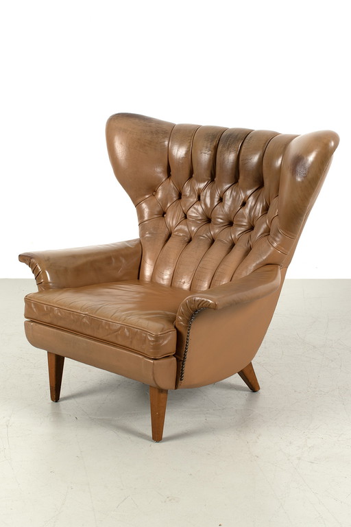 Vintage wingback fauteuil