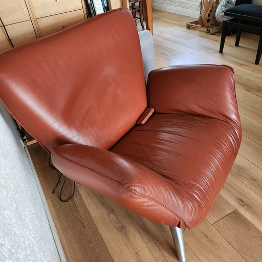 Leolux fauteuil, roodbruin leer