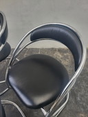 Space age stoelen metaal en skai leer
