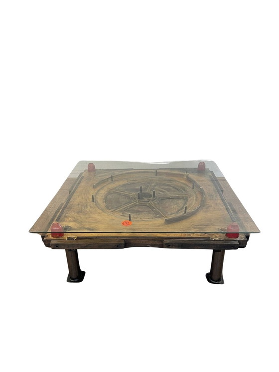 Image 1 of unieke industriÃ«le tafel uit houten mal met negatief treinwiel