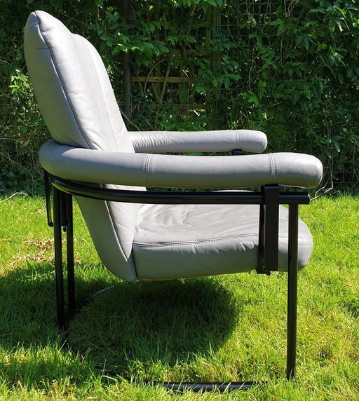 Post Modern Swivel Chair, Black Tubular Frame, Grey Leather, Comfortable