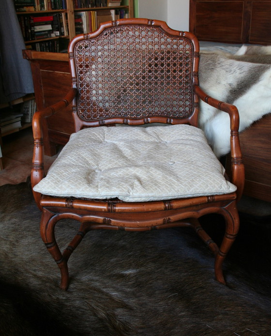 Image 1 of French Provincial faux bamboo wooden armchair