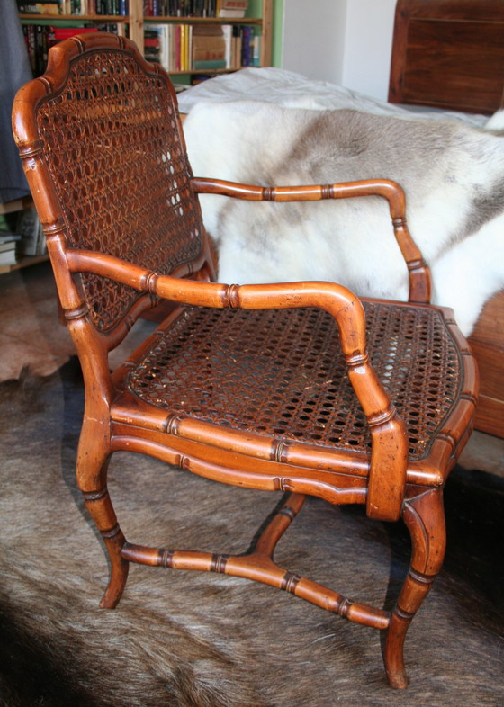 Image 1 of French Provincial faux bamboo wooden armchair