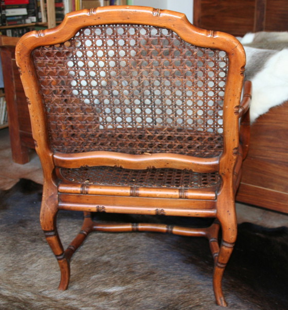 Image 1 of French Provincial faux bamboo wooden armchair