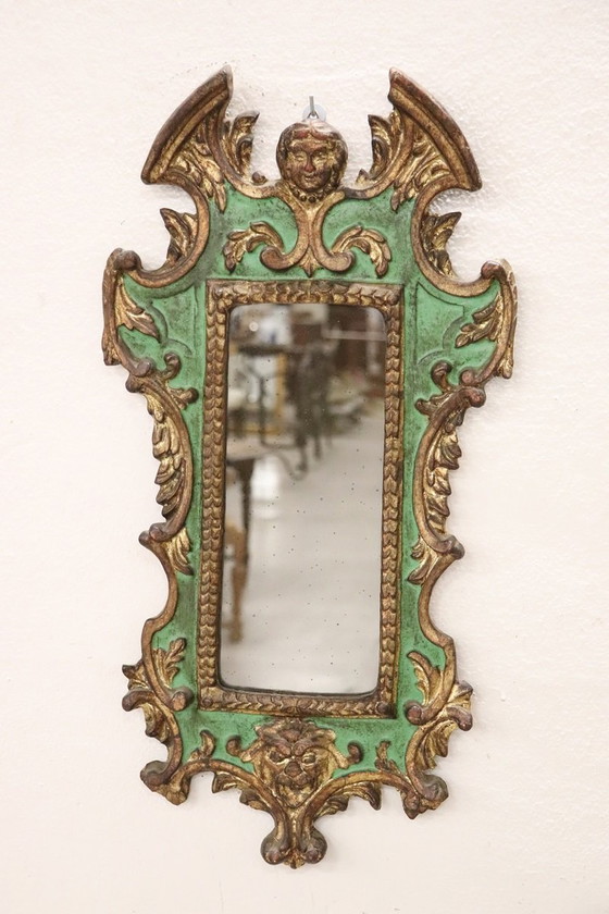 Image 1 of Vintage wandspiegel met gesneden houten frame