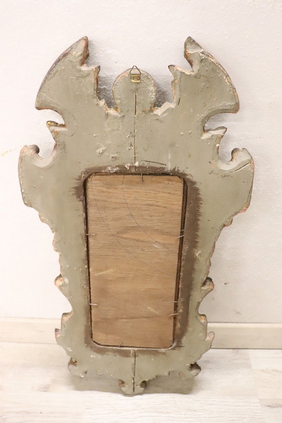 Image 1 of Vintage wandspiegel met gesneden houten frame