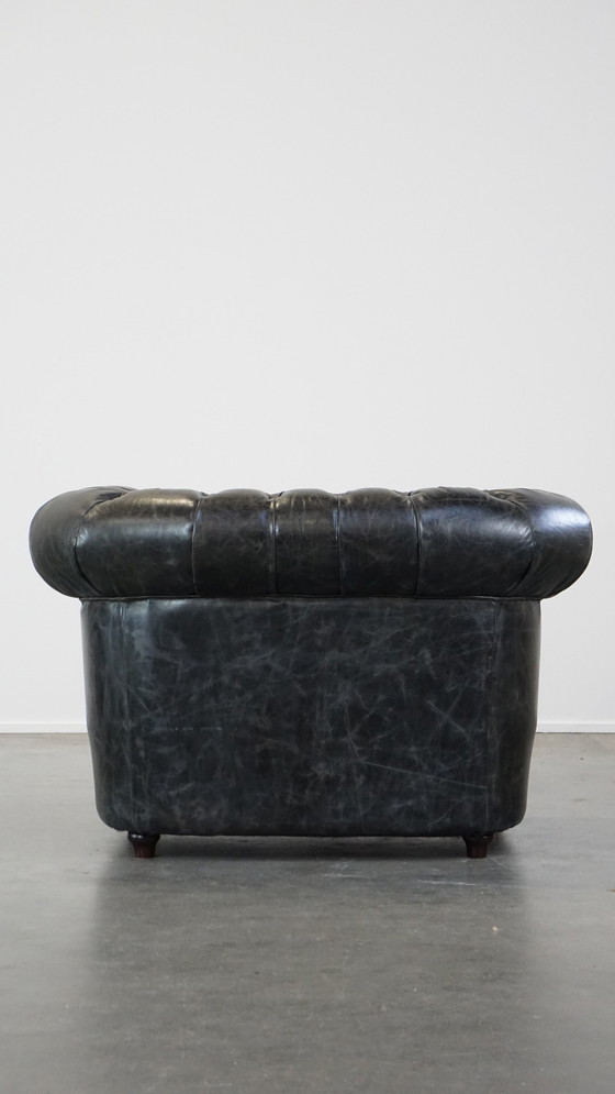 Image 1 of Zwarte Rundleren Chesterfield Fauteuil