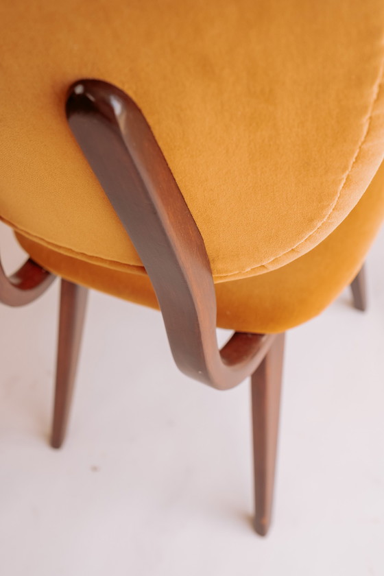 Image 1 of 4x teak vintage eetkamerstoelen geel/gouden bekleding