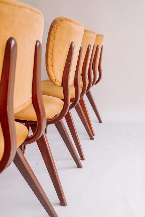 Image 1 of 4x teak vintage eetkamerstoelen geel/gouden bekleding