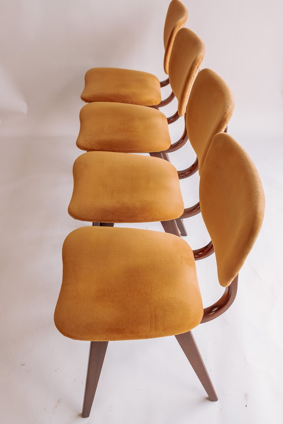 Image 1 of 4x teak vintage eetkamerstoelen geel/gouden bekleding