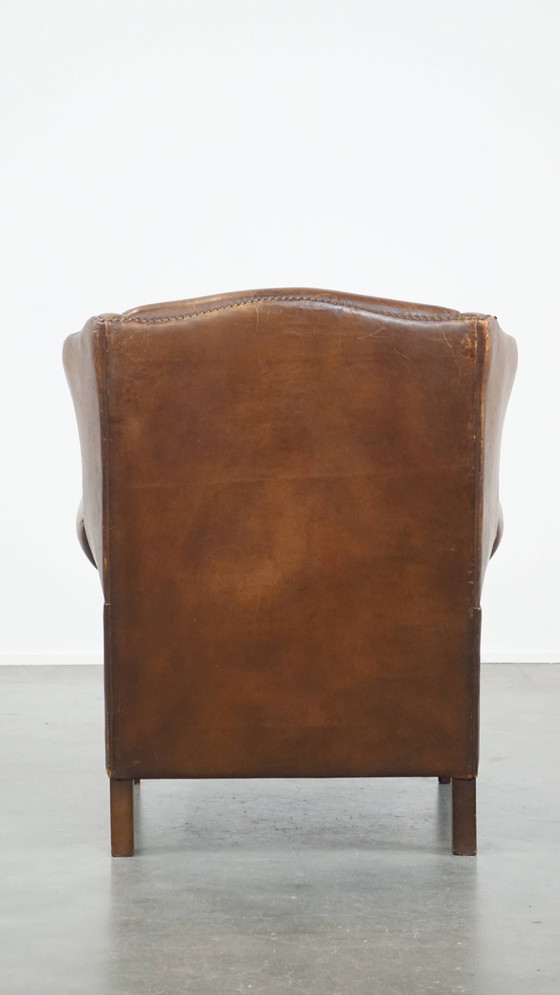 Image 1 of Schapenleren oorfauteuil