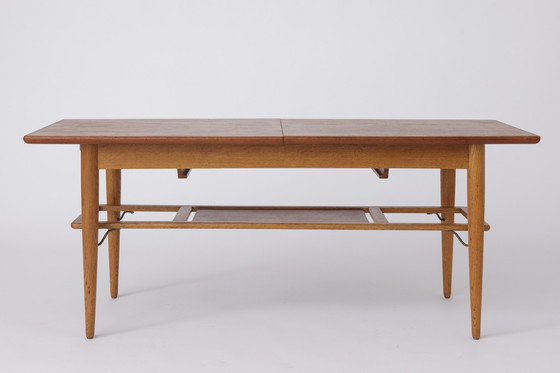 Image 1 of Deense uitschuifbare salontafel van teakhout