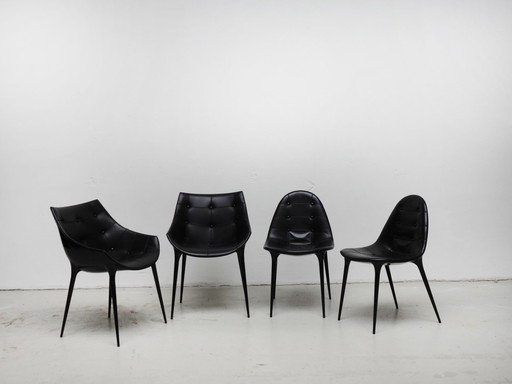 4 zwart lederen Cassina stoelen