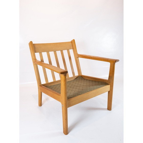 Image 1 of Vintage rode wollen en eiken fauteuil van Hans J. Wegner bij Getama 1960