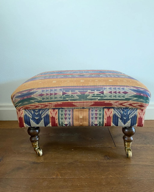 Vintage hocker op wielen