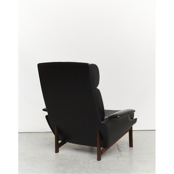 Image 1 of Vintage Adam fauteuil met voetenbank in zwart kunstleer van Kofod Larsen voor Mogens Kold