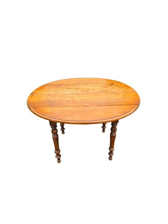 Image 1 of Ronde Antieke Houten Tafel met Inklapbare Zijkanten