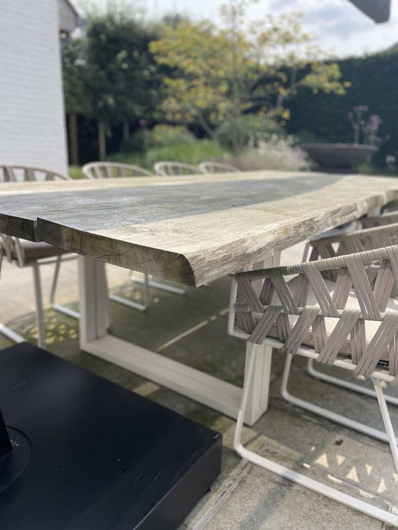 Image 1 of Meubili Tuintafel Met 8 Bijhorende Geweven Stoelen