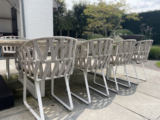 Image 1 of Meubili Tuintafel Met 8 Bijhorende Geweven Stoelen