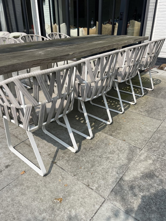 Image 1 of Meubili Tuintafel Met 8 Bijhorende Geweven Stoelen