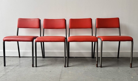 Image 1 of Set van 4 vintage stapelbare stoelen met rood vinyl