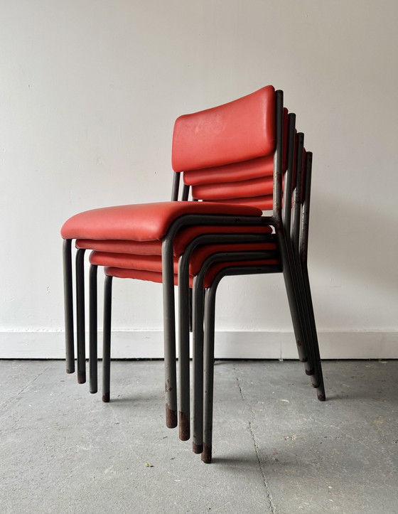 Image 1 of Set van 4 vintage stapelbare stoelen met rood vinyl