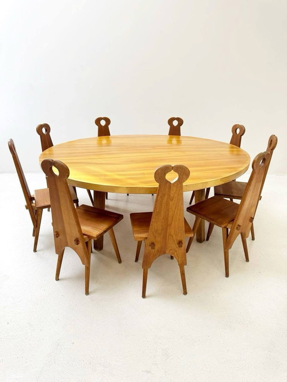 Image 1 of Complete set van massief houten ronde tafel en 12 vintage tafel/boerderijstoelen