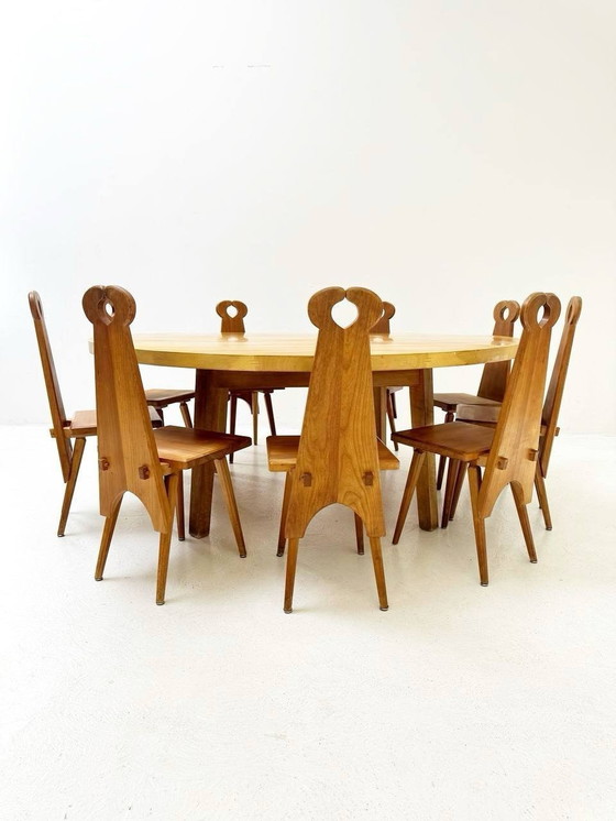 Image 1 of Complete set van massief houten ronde tafel en 12 vintage tafel/boerderijstoelen