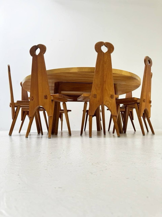 Image 1 of Complete set van massief houten ronde tafel en 12 vintage tafel/boerderijstoelen