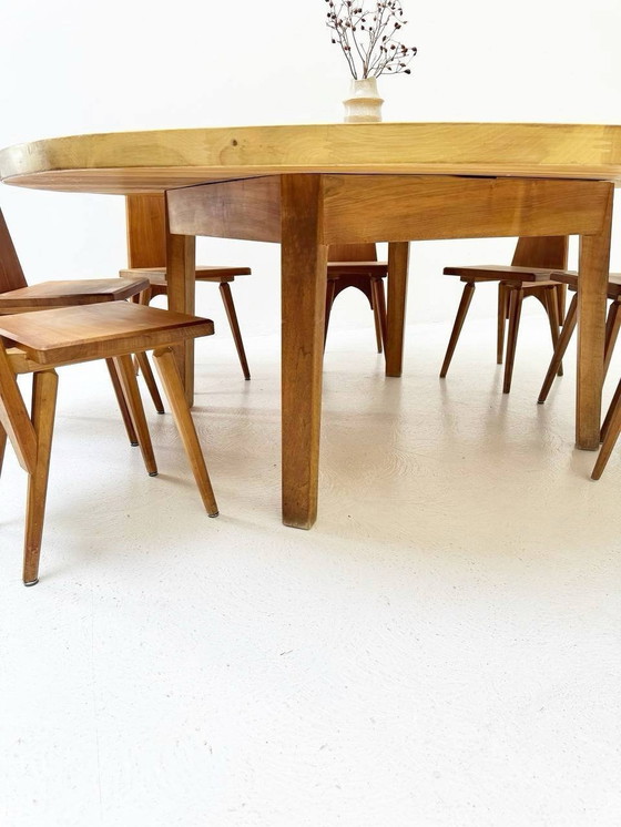 Image 1 of Complete set van massief houten ronde tafel en 12 vintage tafel/boerderijstoelen