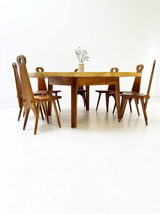 Image 1 of Complete set van massief houten ronde tafel en 12 vintage tafel/boerderijstoelen