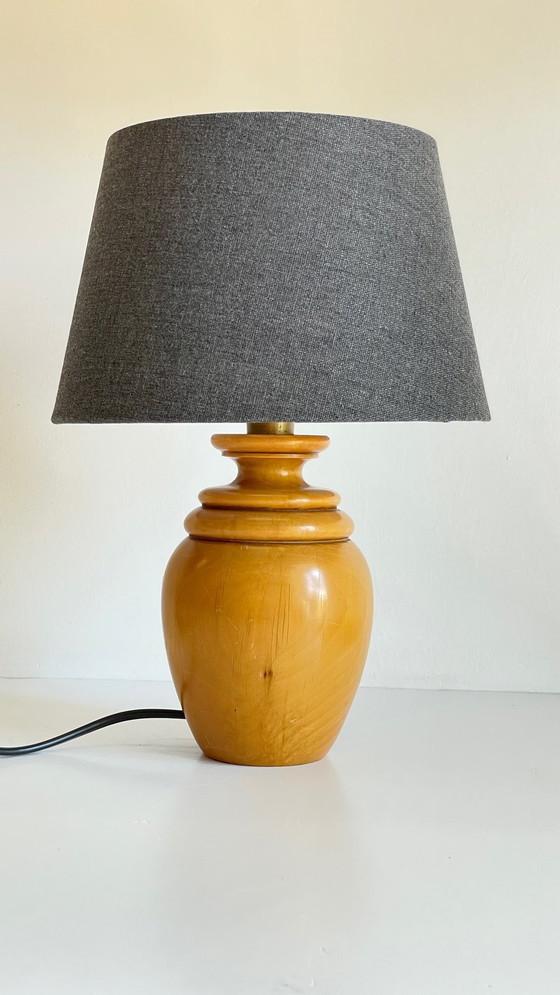 Image 1 of Lamp van massief hout en vintage stof