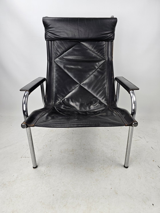 Image 1 of Strässle model HE1106 fauteuil met hocker / voetenbankje