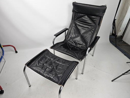 Strässle model HE1106 fauteuil met hocker / voetenbankje