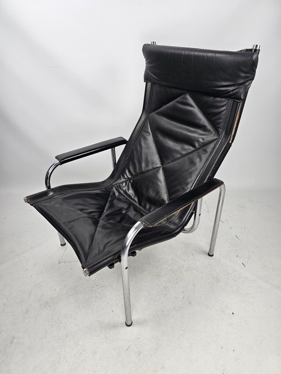 Image 1 of Strässle model HE1106 fauteuil met hocker / voetenbankje