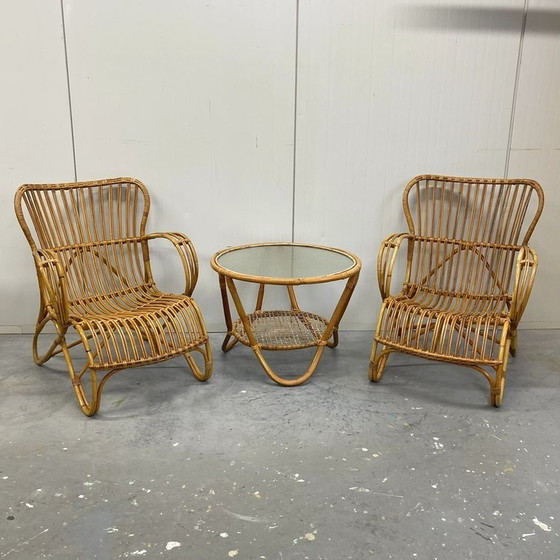 Image 1 of 2x Vintage Rotan Belse stoelen