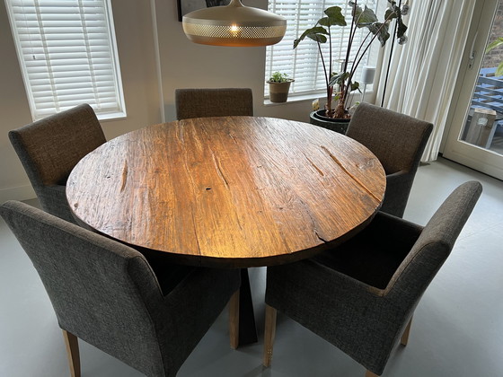 Image 1 of Massief Teakhouten Eettafel Rond, Doorsnee 1.46 M Met Een 4 Cm Dik Blad En Een Ijzeren Kruispoot